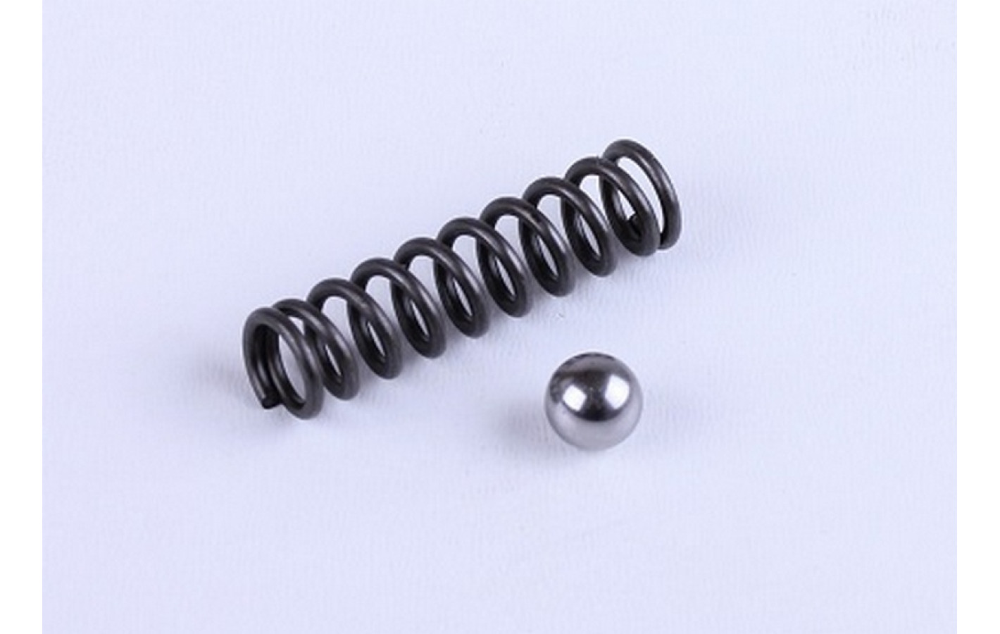 Пружина с шариком фиксирующие вилку передач TTG на дизельный двигатель 180N