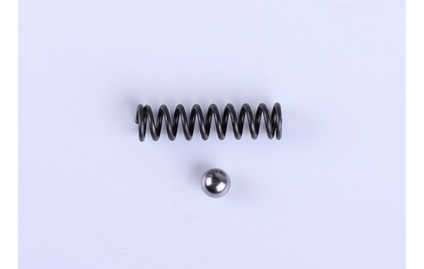 Пружина с шариком фиксирующие вилку передач TTG на дизельный двигатель 180N